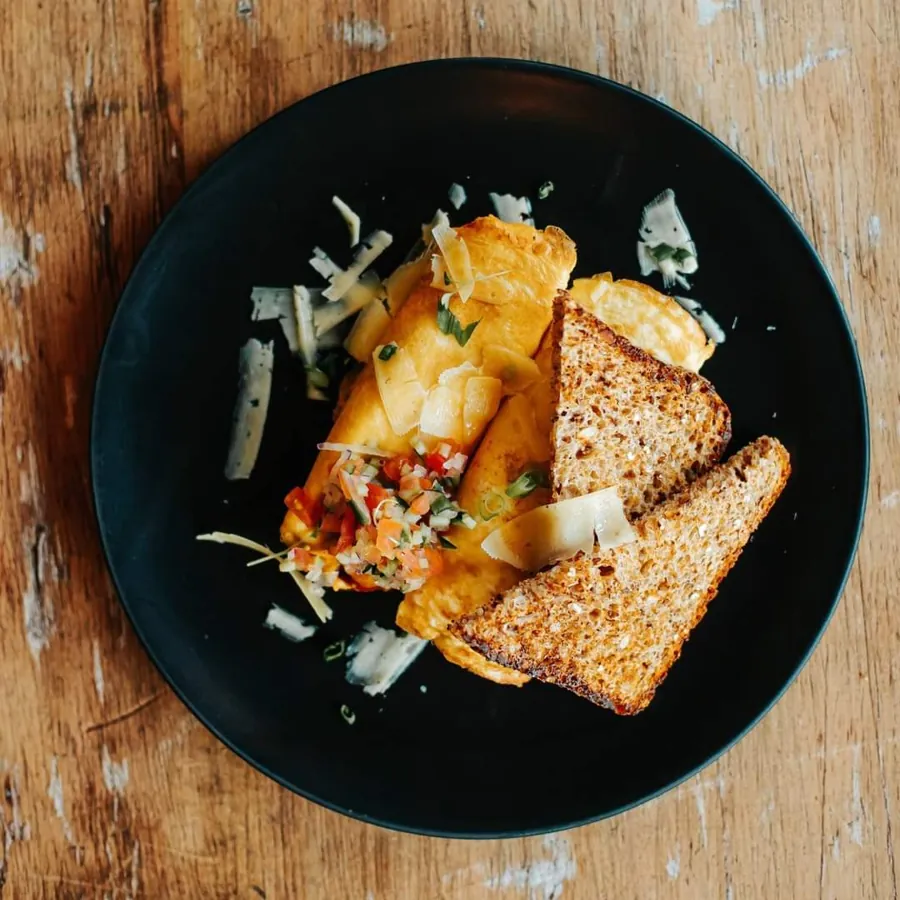 Breakfast rotis with toast in a dark bowl