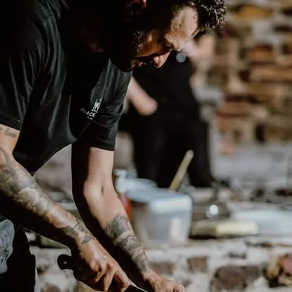 Chef Wayne plating a dish