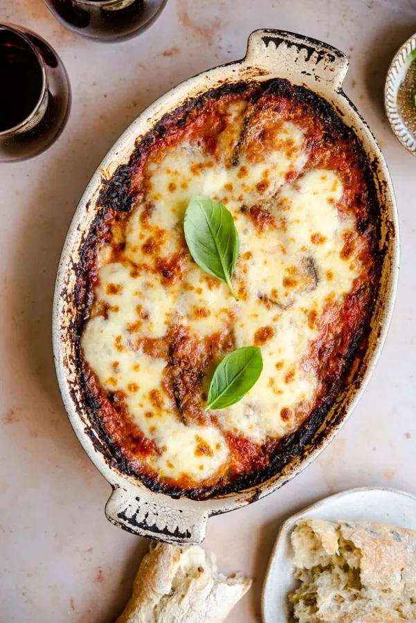 Baked melanzane with golden cheese and basil